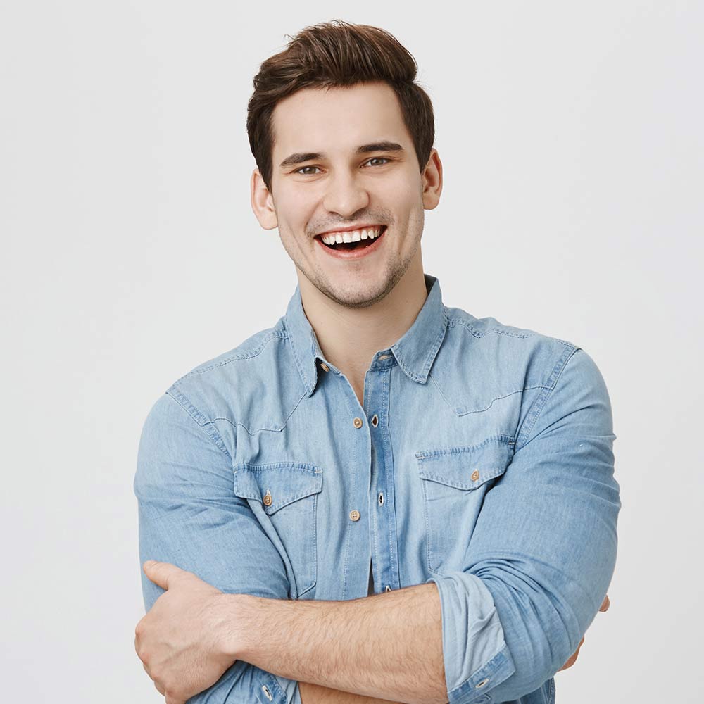 happy-young-man-in-denim-shirt-smiling-2026-01-05-05-47-36-utc.jpg
