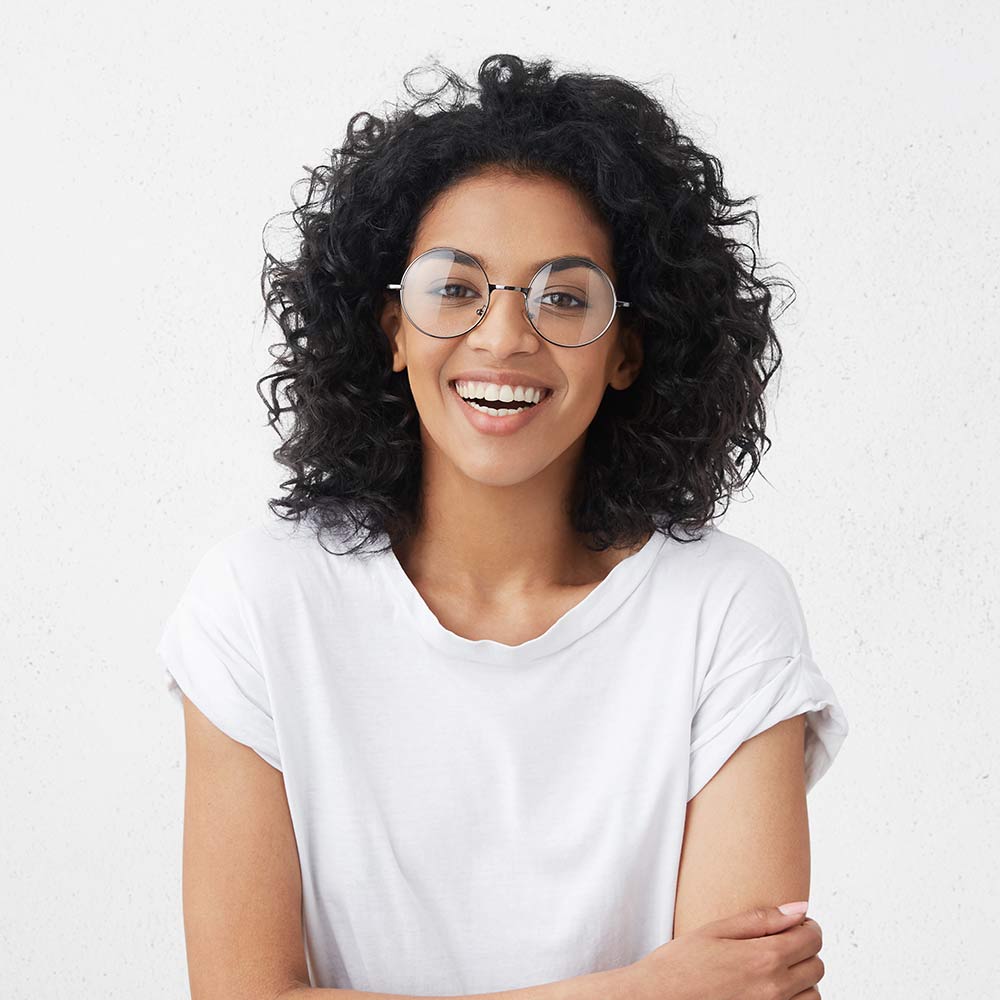 smiling-woman-wearing-glasses-and-white-t-shirt-2026-01-07-01-11-12-utc.jpg